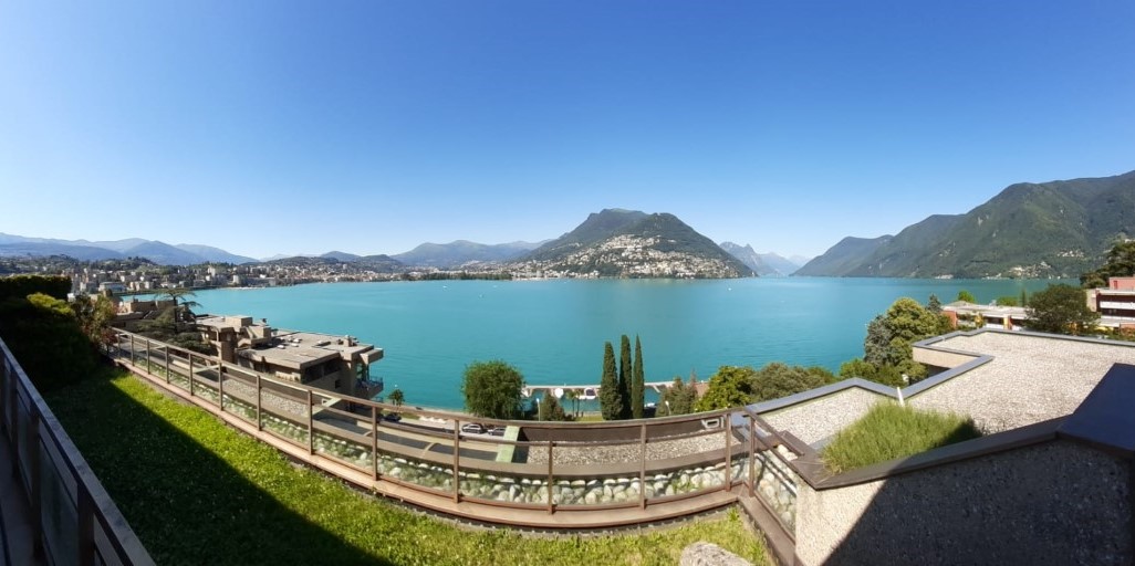 Affittasi magnifico attico di 6 locali con imprendibile vista sul lago di Lugano e ottima quiete